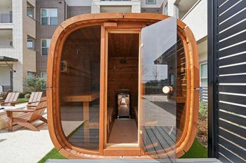 Resort style pool with tanning deck and sauna